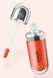 Помʼякшувальний блиск для губ Kiko Milano 3D Hydra Lipgloss 34 Pearly Blood Orange фото